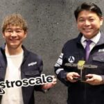 Yusaku Maezawa con Nobu Okada