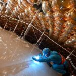 JUNO entra en operación: el experimento internacional que busca resolver cómo se ordenan las masas de los neutrinos.